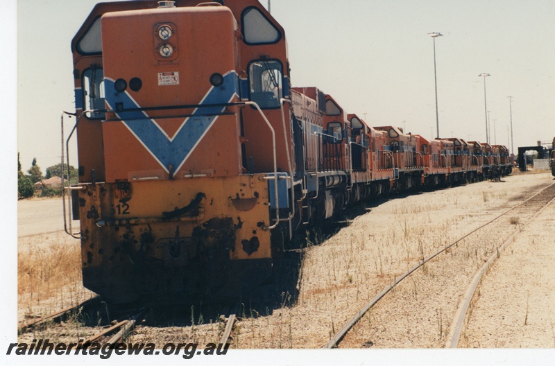 P19463
1 of 13 images of A class diesels en route to New Zealand, lash up of multiple locos in siding, front and side view
