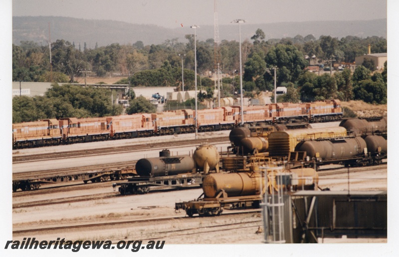 P19475
13 of 13 images of A class diesels en route to New Zealand, WFX class flat wagon with tank from JU class wagon containing sludge and spherical container containing loco sand, lash up of 8 locos, assorted tanker wagons and van, overview of yard
