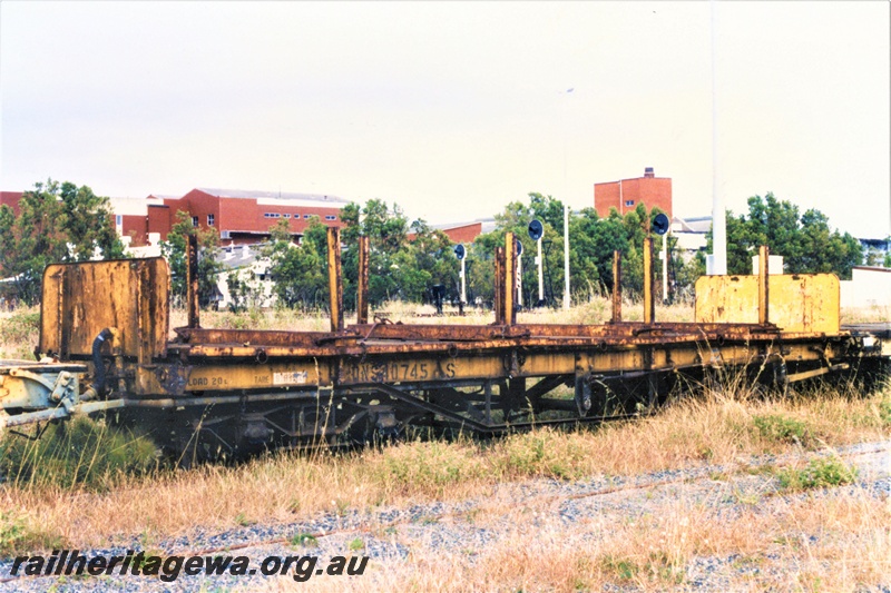 P19482
QNS class 40745-S flat wagon with stanchions end bulkheads, yellow livery, Ex MRWA NB class 339, Robbs, end and side view
