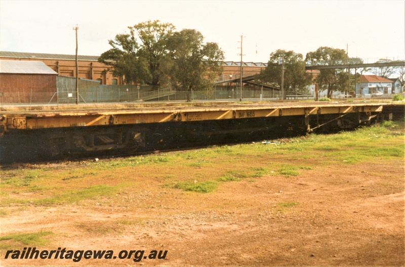 P19483
QMF class 16155 flat wagon, yellow livery, Midland, end and side view.
