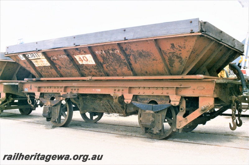 P19542
LA class 23811 ballast hopper, brown livery with plank hungry boards, side and end view
