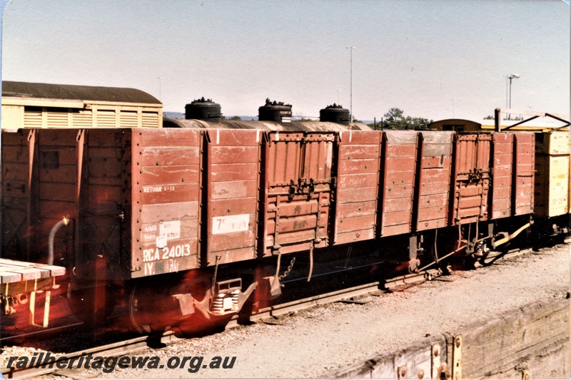 P19549
RCA class 24013 bogie open wagon, brown livery end and side view
