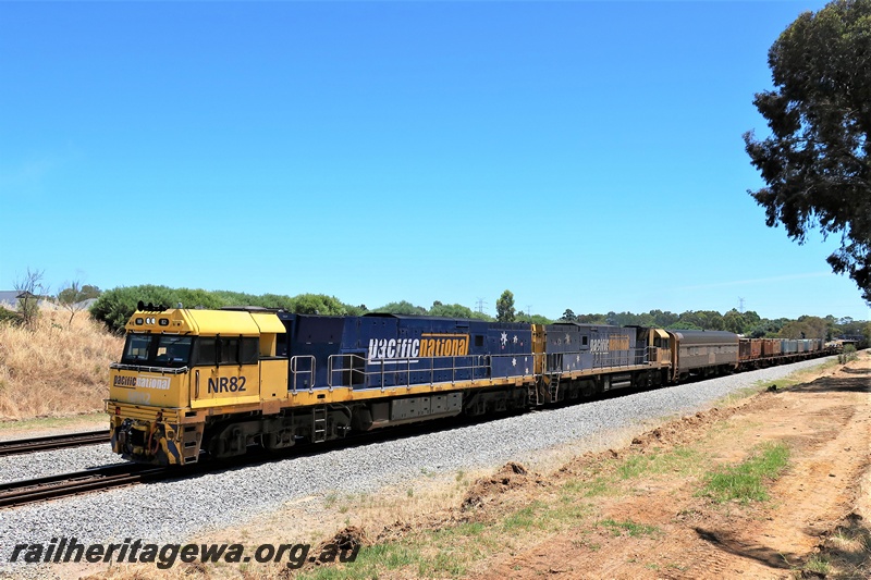 P19556
Pacific National NR class 82 double heads with NR class 92 on a freight train heading southwards through Hazelmere
