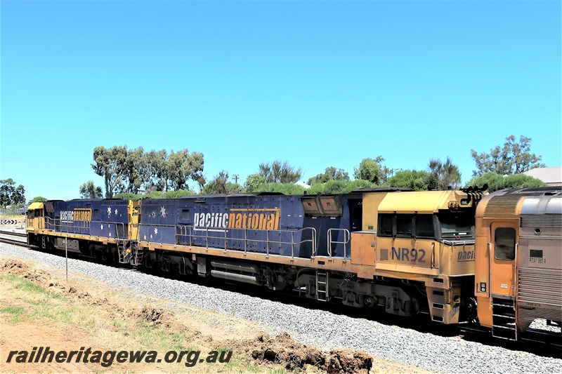 P19557
Pacific National NR class 92 is lead by NR class 82 on a freight train heading southwards through Hazelmere
