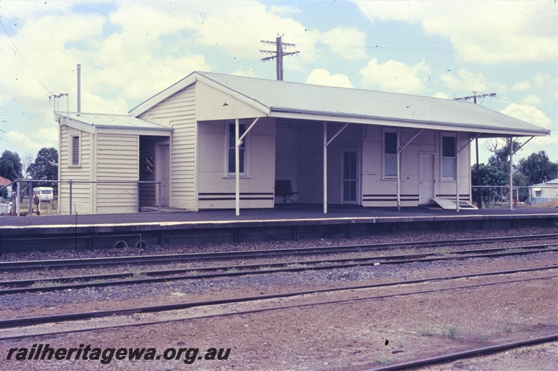 P19584
Station building with attached staff cabin, Yarloop, SWR line, view across the yard, 
