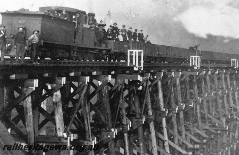 P19602
O class 82 (tender first) crossing wooden trestle bridge over Blackwood River, Bridgetown. PP line.
