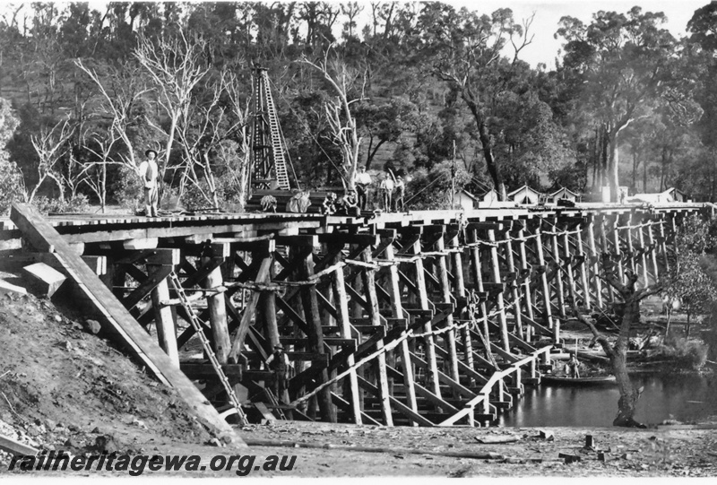 P19607
Bridgetown - wooden trestle bridge under over the Blackwood River under construction. Workers tents in background. PP line 
