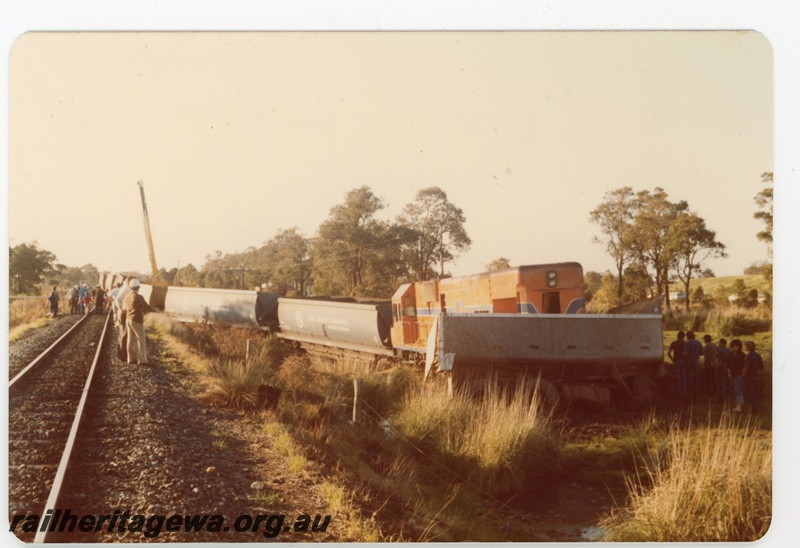 P19619
N class 1880 hauling a SECWA coal train derailed at Wagerup following level crossing accident with truck. SWR line.
