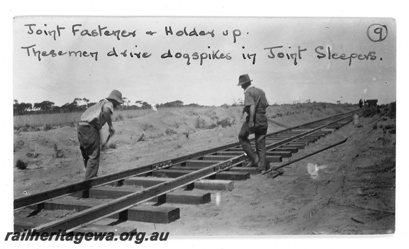 P19667
Installing dog spikes and fish plates. Location unknown.
