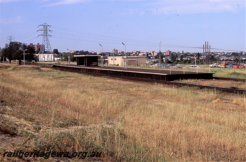 P19723
Platform, station shelter, platform lights, powerlines in the distance, Rivervale, SWR line
