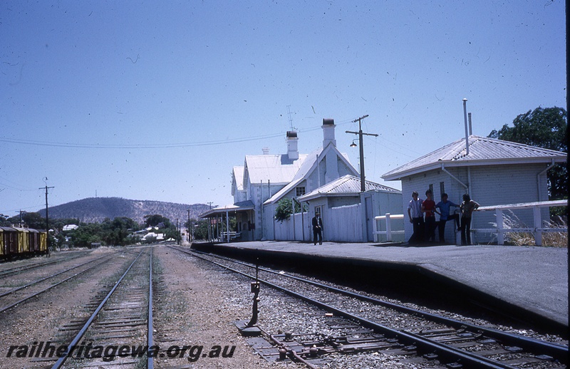 P19762
Platform, station buildings, 5 persons on platform, points, point lever, rodding, track, vans, York, GSR line, track level view, similar to P19757
