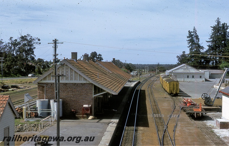 P19794
Station buildings, platform, luggage trolley, parcels office sign, yard, rake of vans, wagons, goods shed, crane, semaphore signals, Mount Barker, GSR line
