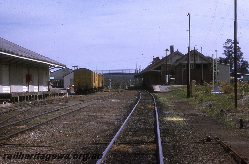 P19795
Station buildings, platform, goods shed, yard, rake of vans, goods shed, trackside buildings, pedestrian footbridge, Mount Barker, GSR line
