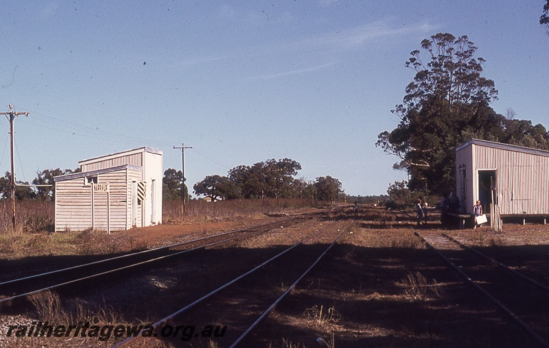 P19817
Station building, station nameboard, goods shed, workers, tracks, Narrikup, GSR line, Easter
