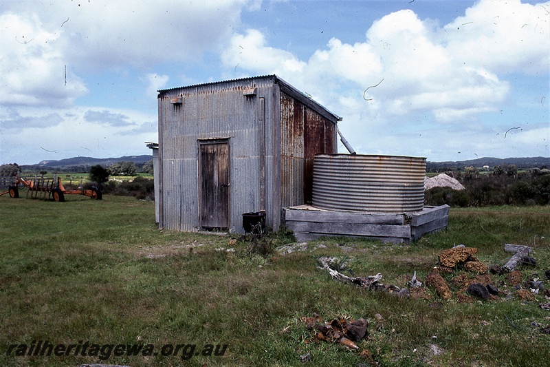 P19862
Out-of shed, water tank, farm machinery, country location 
