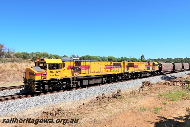 P20000
CBH Group locomotives, DBZ class 2301 City of Bunbury, and, DBZ class 2305 Shire of Harvey on a grain train passing through Hazelmere, 
