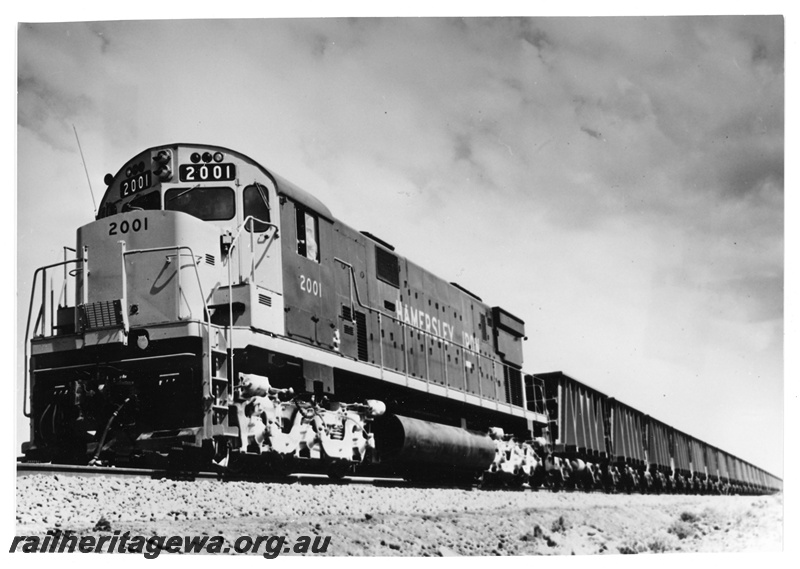 P20006
Hamersley Iron Alco C628 class 2001, on ore train, front and side view
