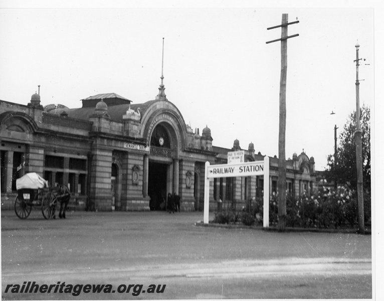 P20011
Railway station faade, horse drawn wagon, 