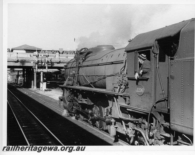 P20089
V class 1206, heading east towards horseshoe bridge, advertisement for 