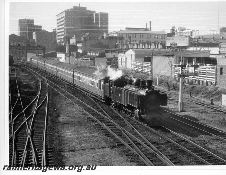 P20098
DM class 587, on suburban passenger service, signal gantry, bracket signals, crossover tracks, approaching Perth city station, side and front view
