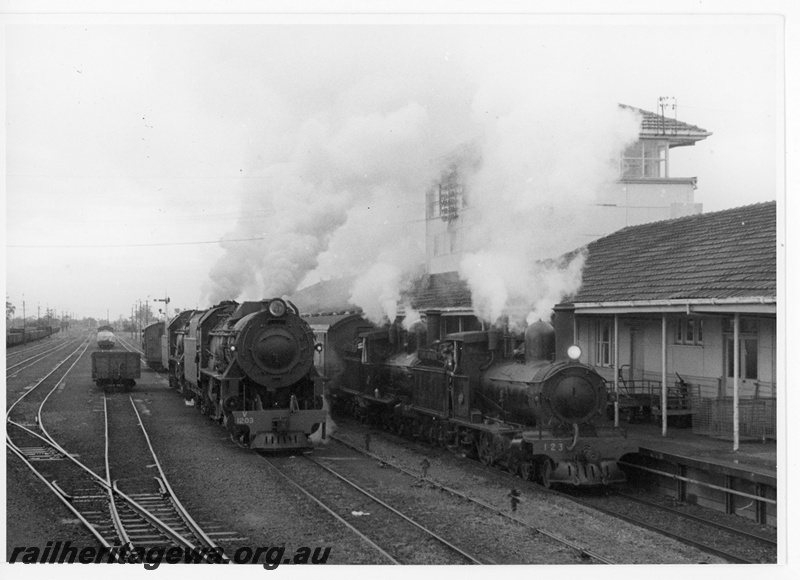 P20101
V class 1203, G class 123, another G class, another steam loco, wagons, vans, sidings, signal, signal box on roof of station building, platform, Brunswick Junction, SWR line, side and front views
