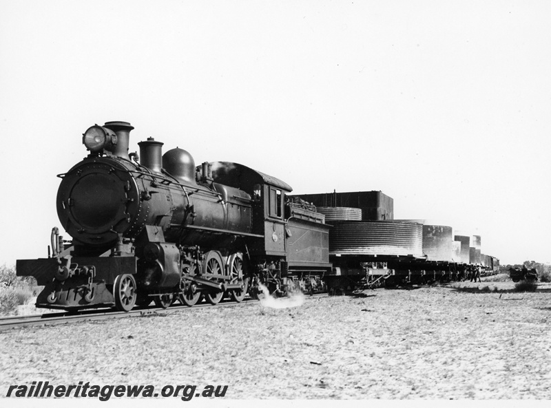 P20103
E class 299, on train laden with water tanks, about to depart triangle, Karalee, EGR line, front and side view
