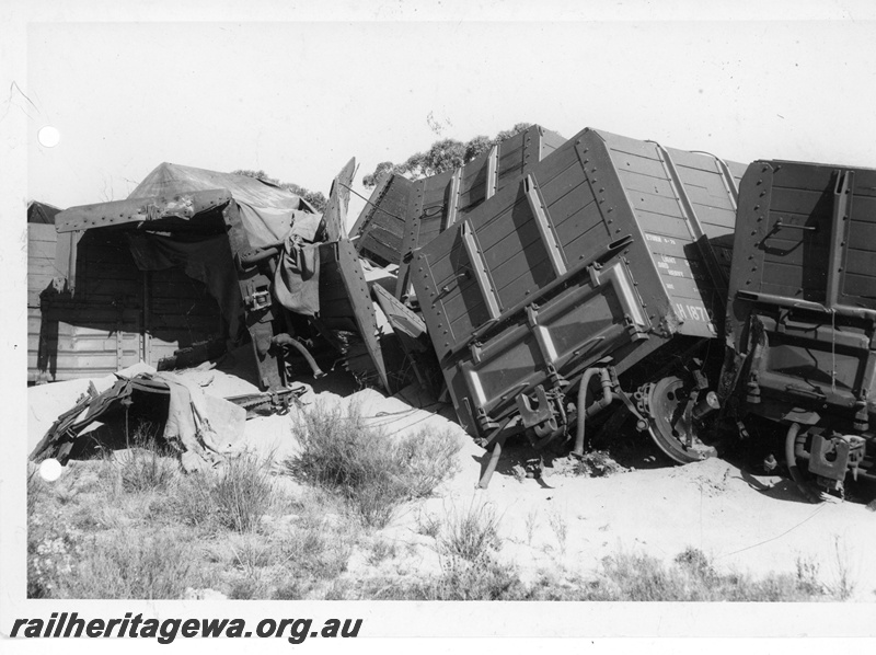 P20163
3 of 4 images of the derailed GH class wagons from No. 506 Goods between Calingiri and Piawaning, CM line
