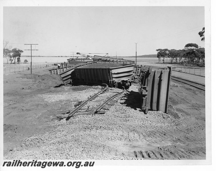 P20168
Derailment of loaded iron ore train near Southern Cross. Photo shows several rolled over WO class wagons and track damage. EGR line.
