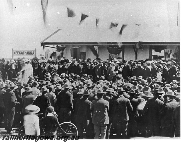 P20180
Opening of Nannine to Meekatharra railway. Showing crowd of people at Meekatharra station and station name. NR line.
