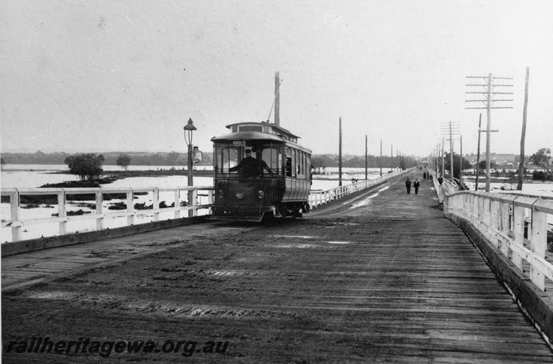 P20196
Single truck tram No. 3,  with a clerestory roof, crossing the old Causeway
