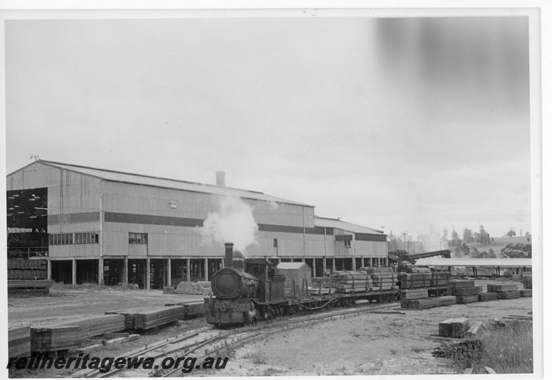 P20209
State Saw Mills loco SSM No 2 locomotive at Pemberton timber Mill , hauling sawn timber to the WAGR siding.PN line.
