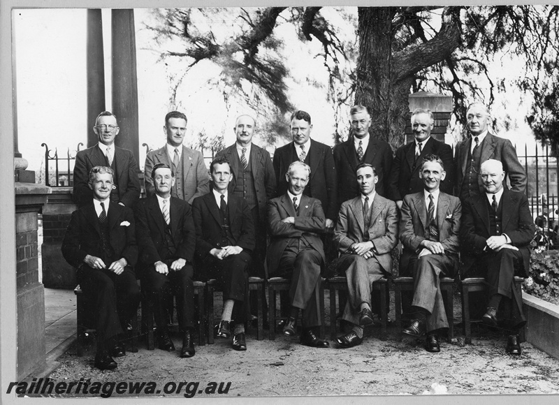 P20242
Group photo of the Chief Mechanical Engineer's staff: Back Row - Left to Right: L. Price (Chief Clerk), H. Holland (Work's Manager's Clerk) H. Moore (Foreman) Coppersmith) J. Thomas (Foreman Fitter) G. Loveridge (Foreman Track Equipment) T. Clough (Foreman Elect.) J. Johnson (Foreman Machine Shop) Front Row: - Left to Right: J.H. Makin (Foreman Boilermaker) B. Copley (Foreman Painter) T. Marsland (Chief Mechanical Engineer) R. Johnson (Works Manager) C. Pearce (Car & Wagon Foreman) J. Redpath (Foreman Blacksmith) T. Fergie (or Ferguson) Foreman Moulder)
