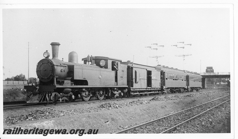 P20247
N class 76 passing under the Maritana Street bridge Kalgoorlie on a passenger train to Boulder. EGR line. 
