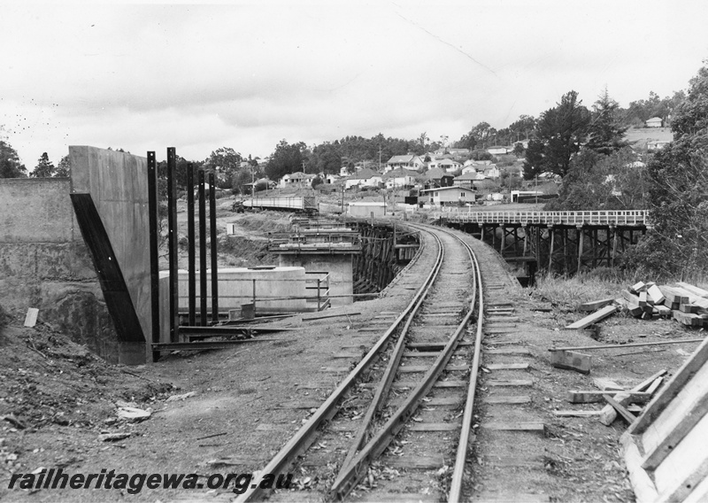 P20249
Bridgetown - construction of new railway bridge over the Blackwood River. Photo taken looking along existing wooden railway bridge, road bridge on right side of the photo. PP line. 
