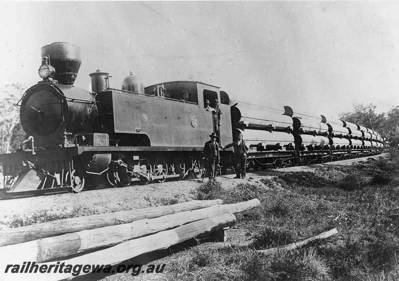 P20254
K class 37 hauling a train of pipes for the construction of the Mundaring-Kalgoorlie pipeline. ER line. 

