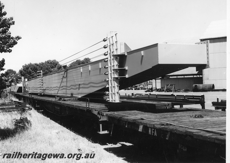 P20274
Transport of Vickers Hoskins gantry crane to Avon Yard No 3 of 4, QU class wagon laden with crane component, NFA class wagon, Midland, ER line, side and end view
