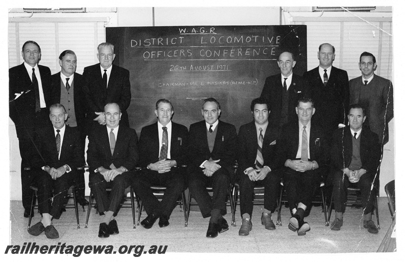 P20281
Group photo of attendees, WAGR District Locomotive Officers' Conference, including in the front row Mr Luke Pitsakis (centre), Mr John Di Masi (third from right), Mr Colin Milner (second from right), and in the back row Mr Les Downey (extreme left) and Mr Jock Bishop (second from right)

