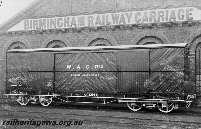 P20310
GB class 2847 bogie covered wagon with diagonal planking, later V class 2847, outside Birmingham Railway Carriage works, side and end view
