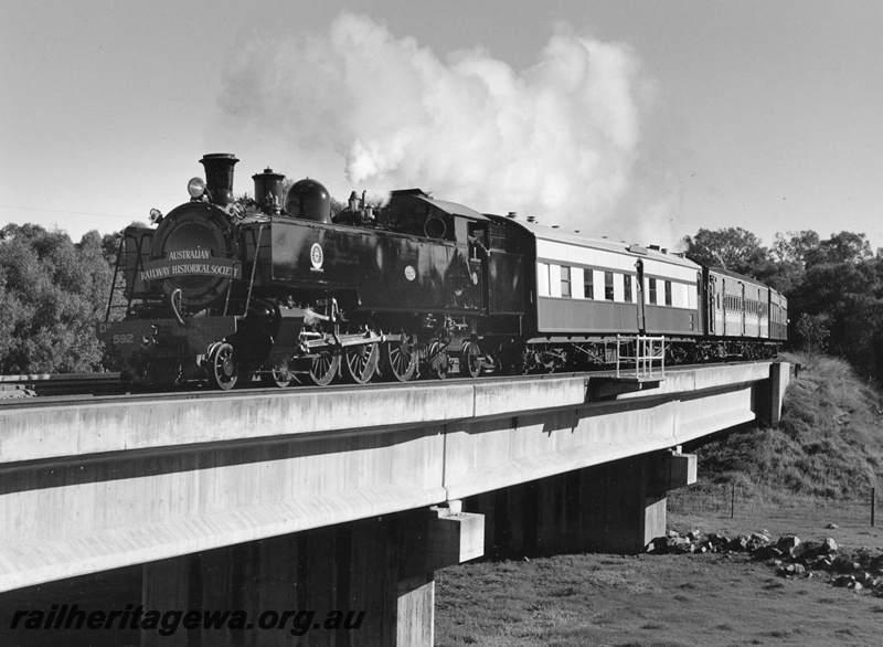 P20381
DD class 592 at Woodbridge West. First trip around Perth area after restoration at Midland workshops. ER line ?
