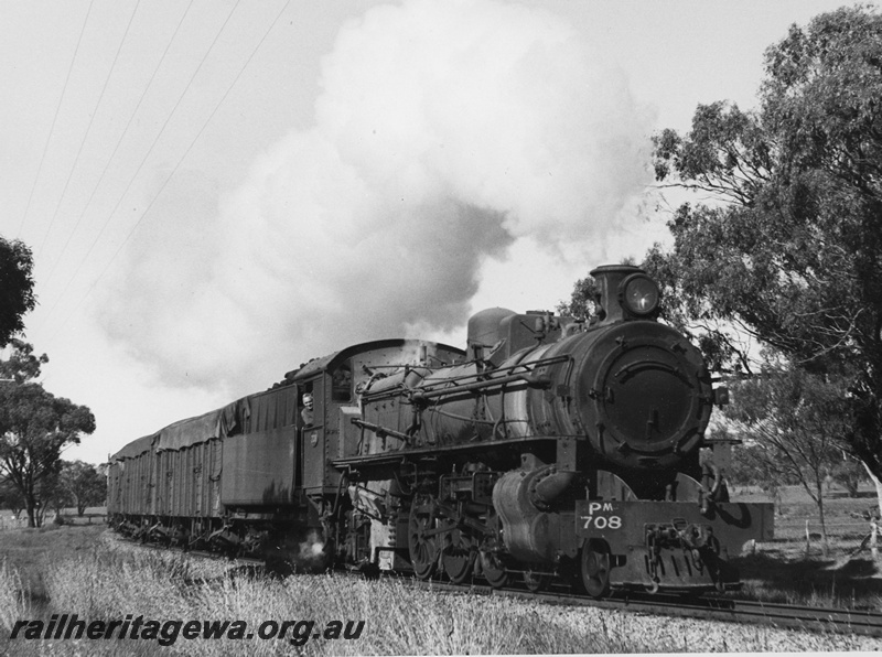 P20386
PM class 708 hauling goods train to Wyalkatchem, near East Northam racecourse. EM line.
