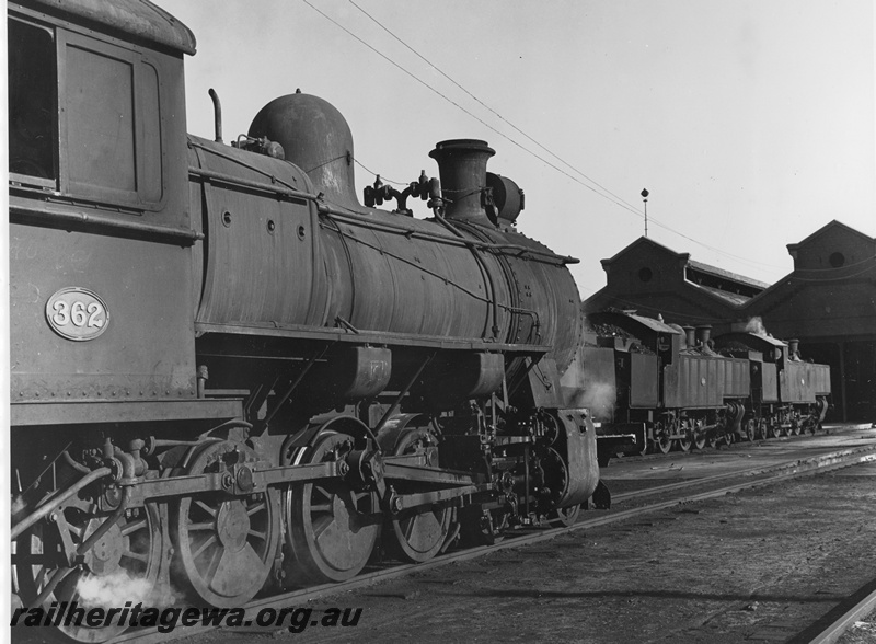 P20388
FS class 362 at East Perth Loco shed. Side/rear view of engine unit only (tender not visible). Two DD class locomotives behind. ER line.
