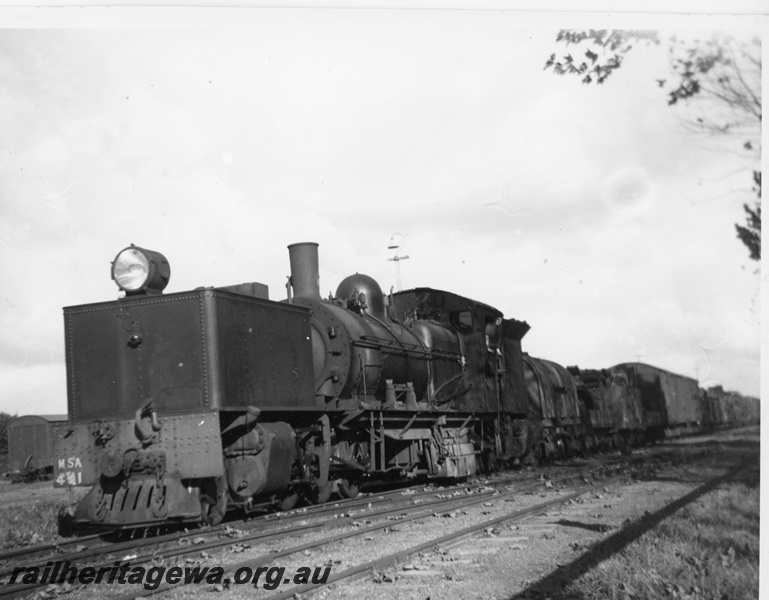 P20394
MSA class 491 on a goods train, front and side view looking along the train
