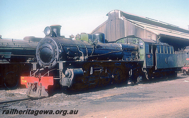 P20416
Pm class 704 at East Perth steam locomotive depot. Locomotive has WAGR crest on tender.ER line.
