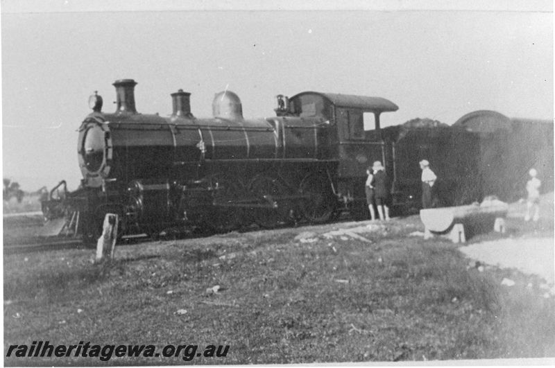 P20431
E class steam locomotive in like new condition, Children looking at locomotive, horse trough in the view. Front and side view.
