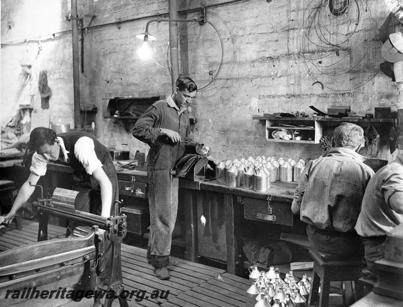 P20450
Oil can manufacture, turning machine, vice, bench, oil cans, duckboard floor, workers, copper shop, Midland workshops, ER line, interior view
