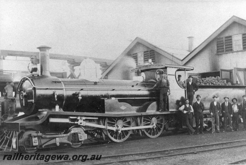P20462
R class loco, crew and onlookers, sheds, loco depot, front and side view
