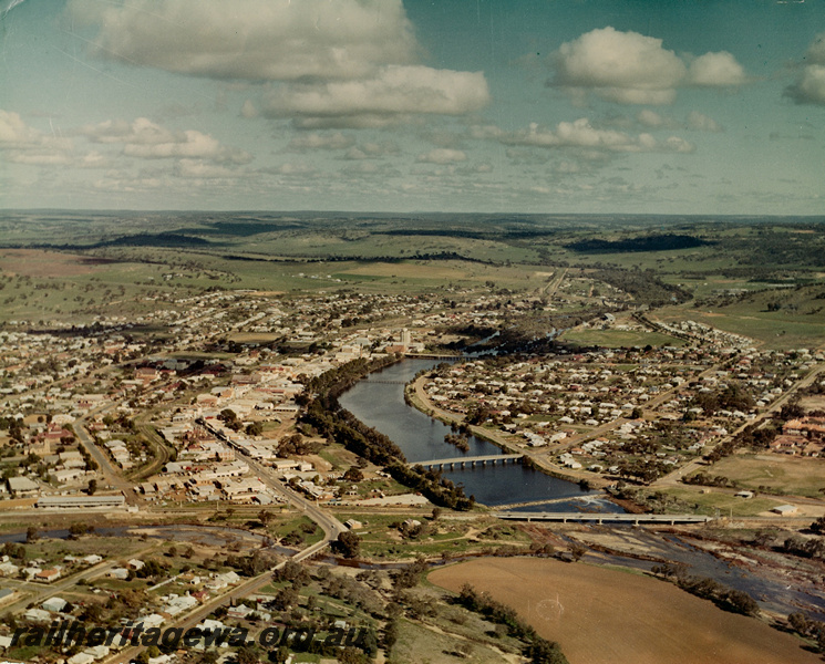P20523
Town of Northam, river, houses, buildings, silo, bridges, and surrounding countryside, ER line, aerial view
