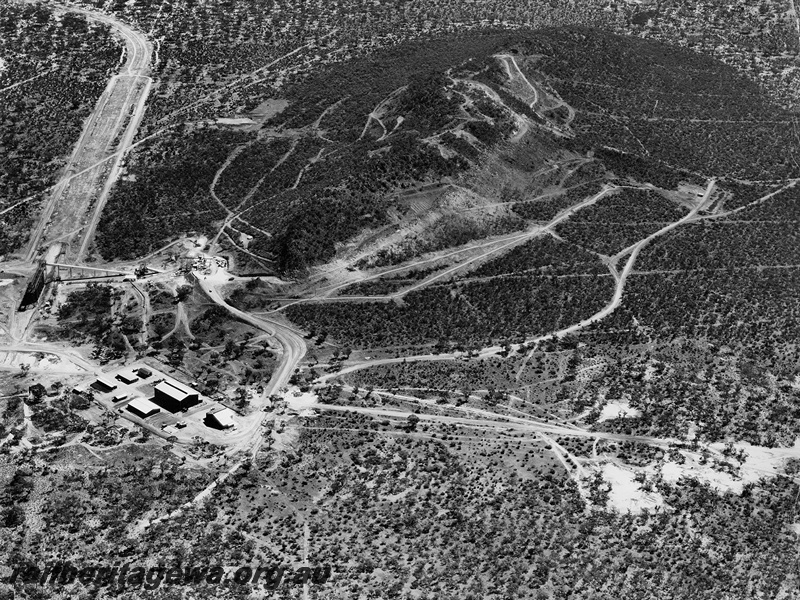 P20527
Industrial buildings, conveyor, roads, Koolyanobbing, EGR line, aerial view, c1966
