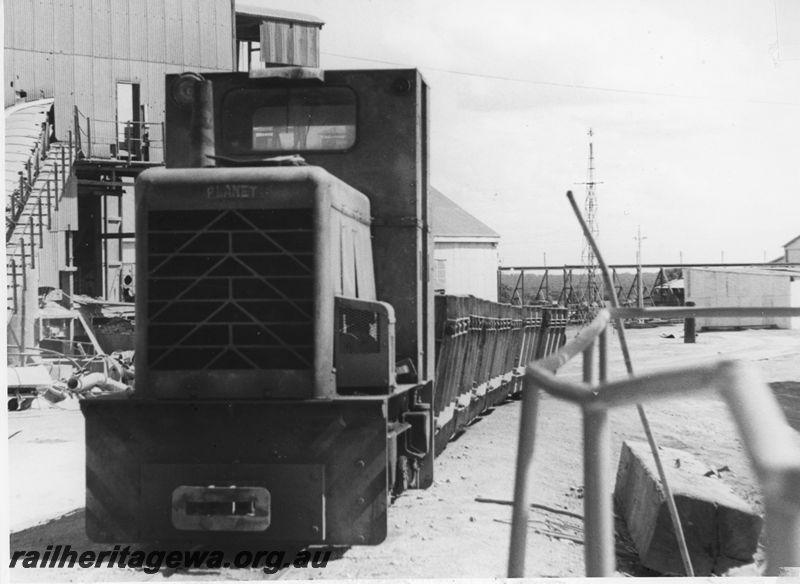 P20530
Lake View and Star(LV&S) Planet chain driven loco at their crusher site with a train of ore wagons, front and side view
