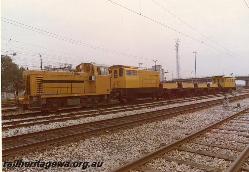 P20536
Italian locomotive and train, tracks, bridge, power lines, 